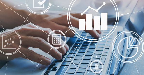 Laptop keyboard behind icons of data and tech symbols and dotted lines