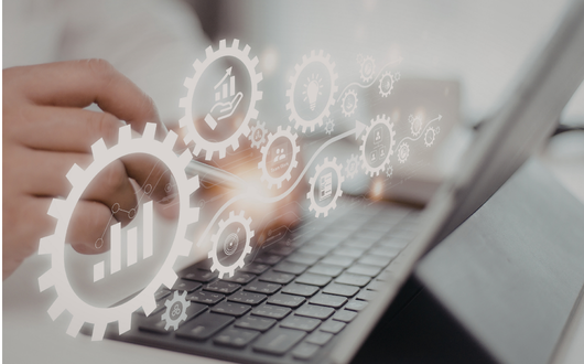 digital analytics symbols floating over a device