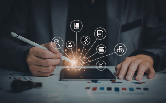 a person making a selection from floating digital technology symbols