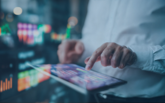 a person clicking on a digital screen of data