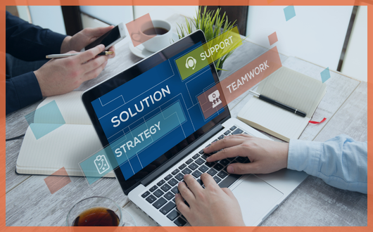 A computer screen displaying solution, strategy, support, and teamwork