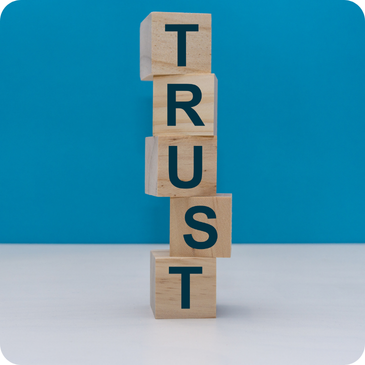 The word Trust spelled out in stacked block letters