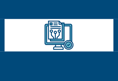 A computer screen with a check mark and a paper with graphs on top of it