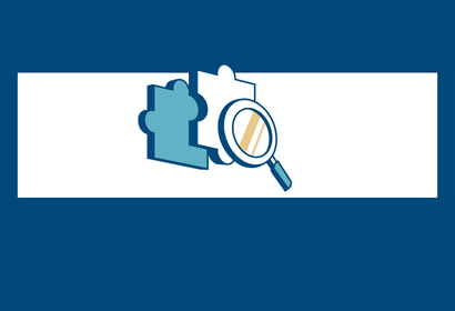 3-d icon of a magnifying glass looking over 2 puzzle pieces on a blue background